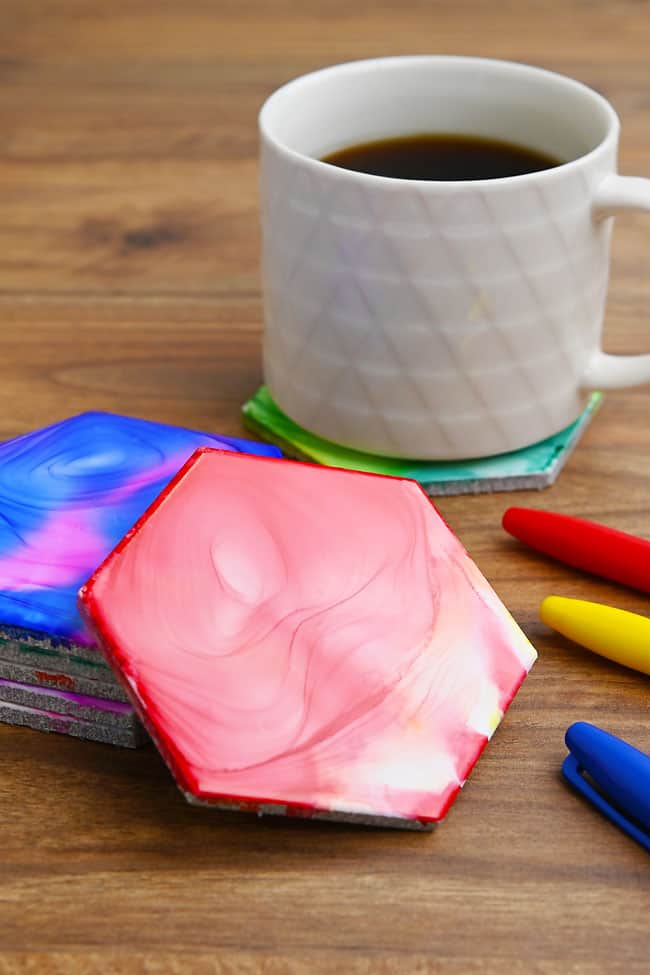 Fire Tile Art Colorful swirl pattern on coasters made with alcohol and flame