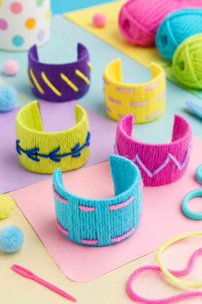 Yarn Wrapped Paper Roll Bracelets Cute and colorful yarn wrapped paper roll bracelets