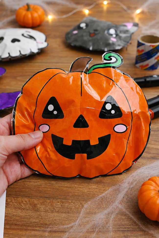 Halloween Squishy DIY Closeup of a pumpkin squishy with jack-o-lantern face