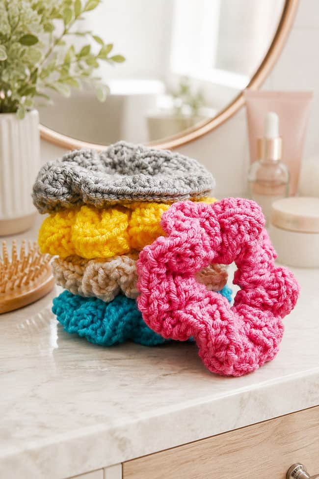 Loom Knit Scrunchie Colorful loom knit scrunchies sitting on a vanity
