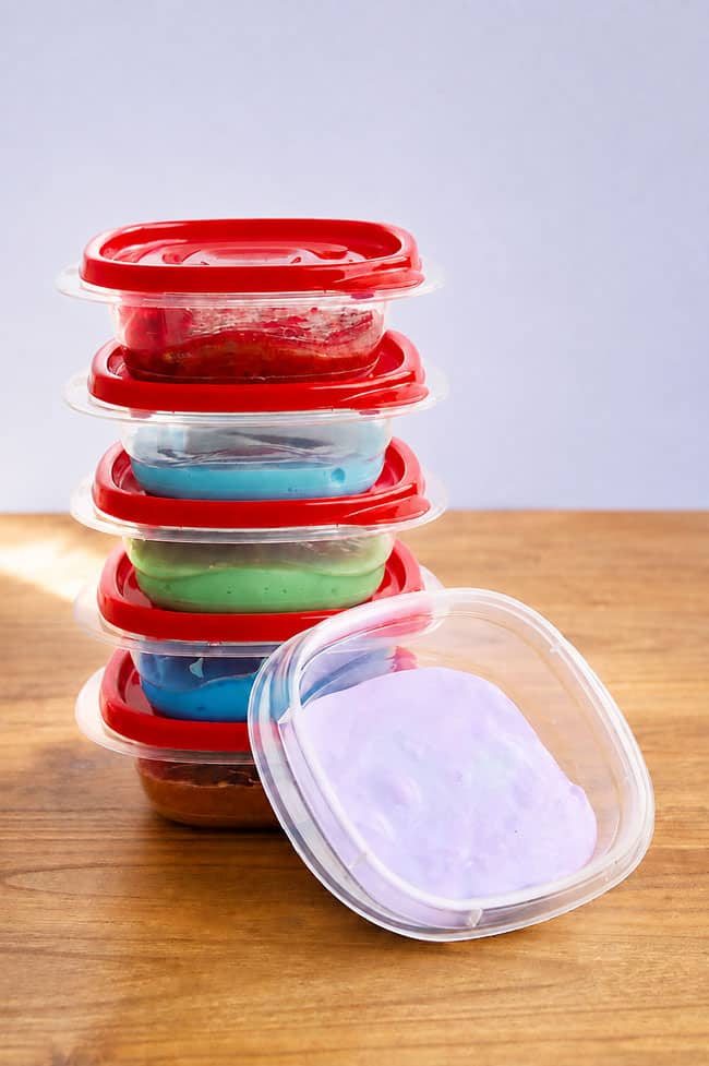 Slime Care Tips Slime in airtight containers with purple slime at the front