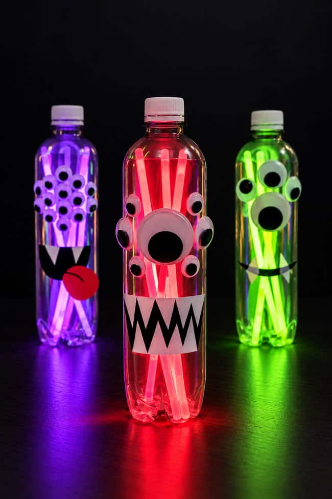 DIY Glow Stick Lanterns Purple, red, and green monster lanterns with glow sticks