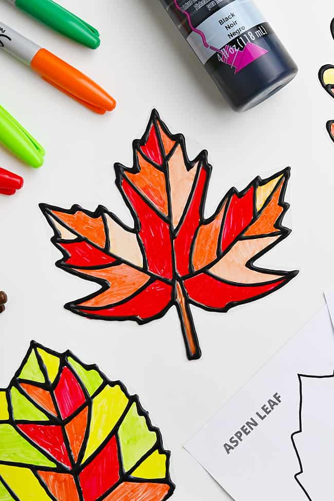 DIY leaf window clings with craft supplies to make more